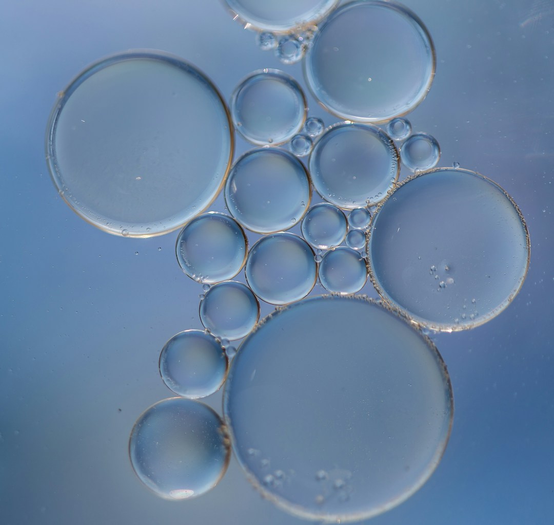 Water droplet macro image representing skin microbiome balance conceptually